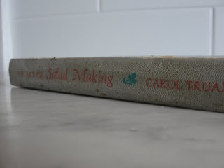 salad making book by carol truax on table