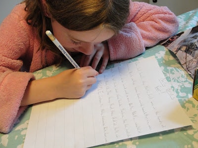 child writing a story