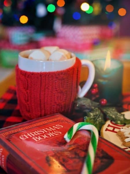 christmas book with hot chocolate