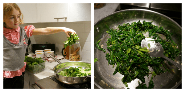 child making spanakopita filling