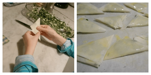 child folding spanakopita