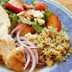 Spinach and strawberry chicken salad bowl