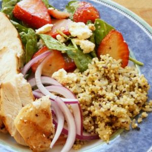 Spinach and strawberry chicken salad bowl