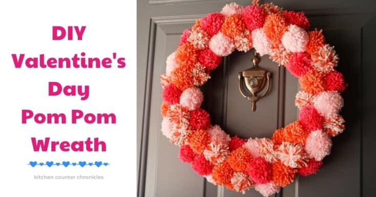 DIY valentines day pom pom wreath hanging on door with title