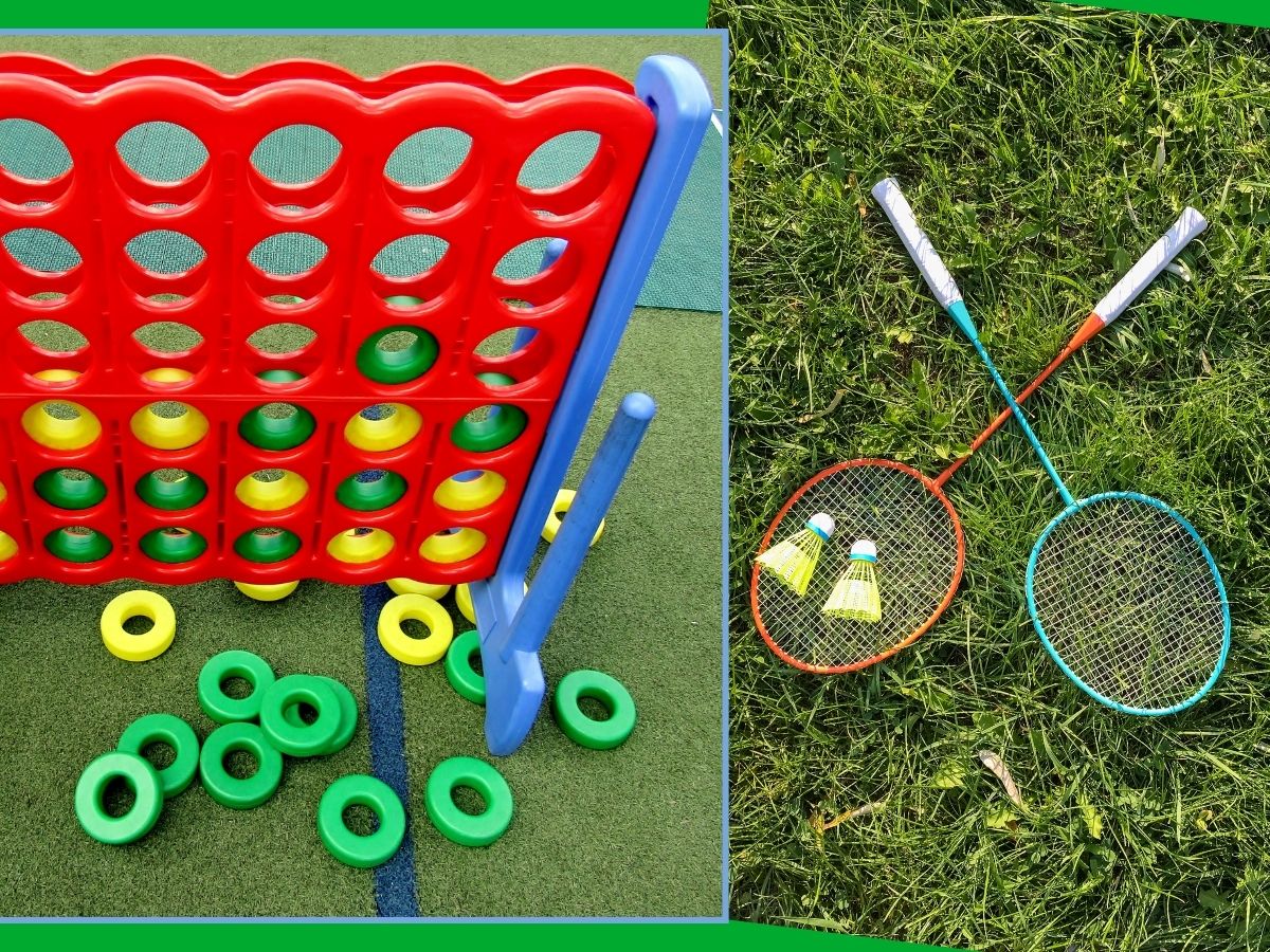 giant outdoor connect four game and set of badminton rackets with birdie in the grass