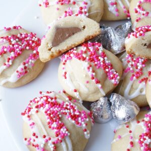 plate filled with chocolate kiss filled cookies decorated for Valentine's Day