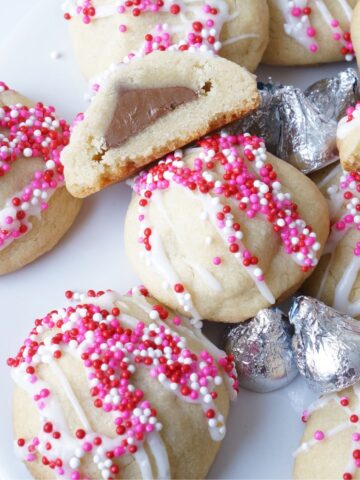 plate filled with chocolate kiss filled cookies decorated for Valentine's Day