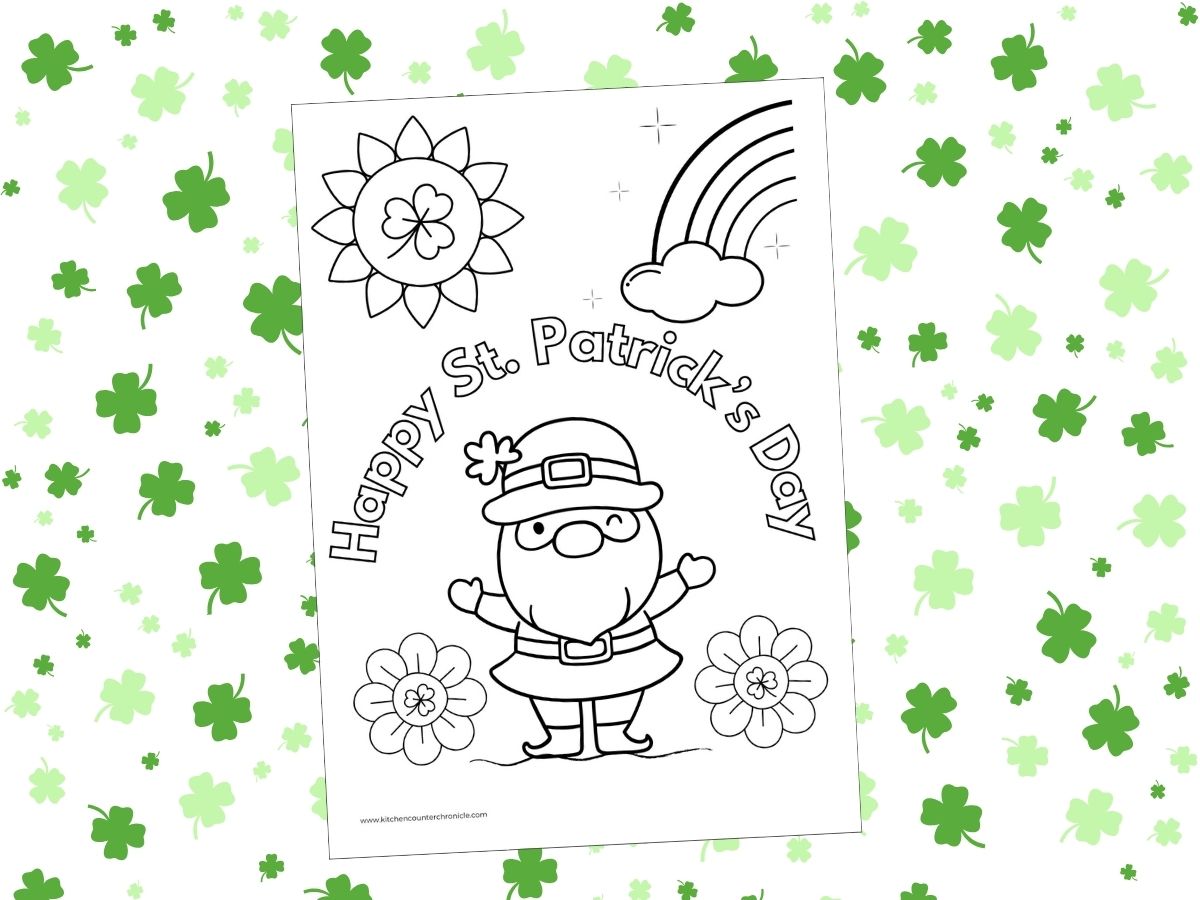 happy st patricks day leprechaun with rainbow and shamrocks colouring sheet