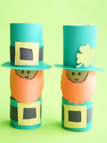 2 st patrick's day leprechauns wearing tall hats and red beards craft