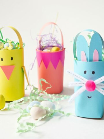 easter bunny basket, pink easter basket and easter chick basket made from paper rolls and filled with eggs