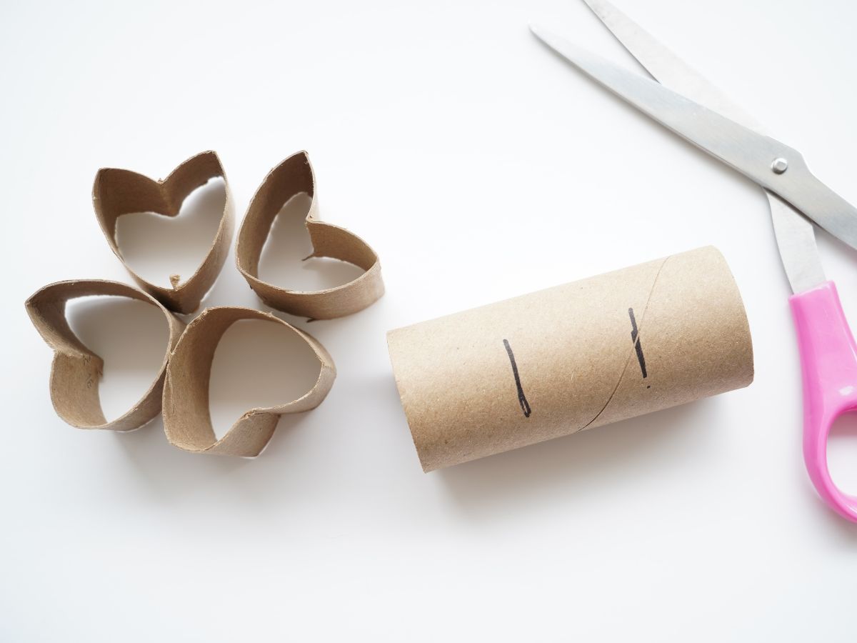 toilet paper roll with lines dividing roll in thirds and 4 unpainted paper roll hearts