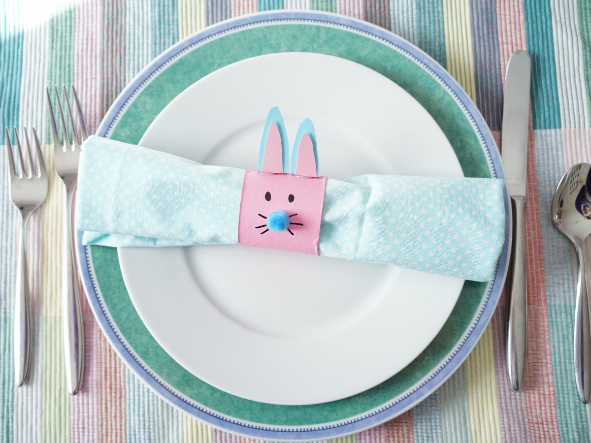 toilet roll bunny napkin ring with polka dot napkin ring sitting on plate